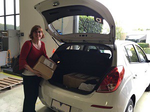Sue Ellson collecting first books from IngramSpark Printers 18/02/16